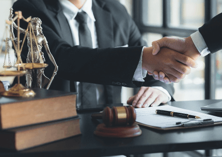 Handshake with a personal injury attorney